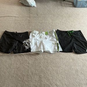Lot of three Old Navy Mens board shorts in XXXL.  One pair is new with tags.